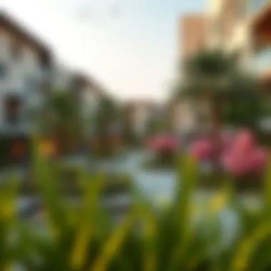 Vibrant community space with lush greenery and social areas in Al Nakhil.