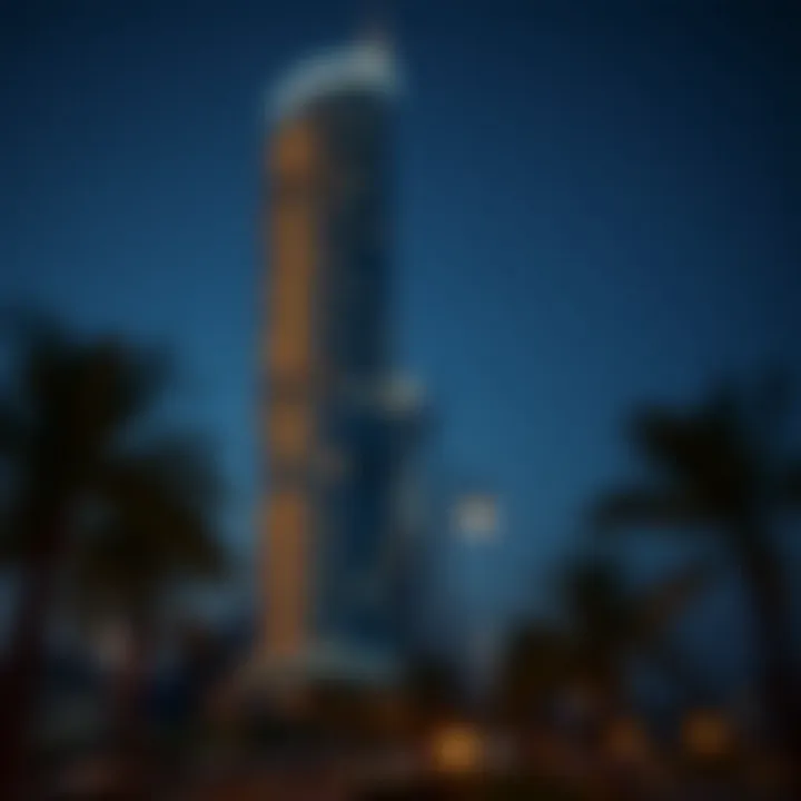 Bahwan Tower Illuminated at Night An evening shot of Bahwan Tower illuminated, reflecting its prominence in the luxury living experience.