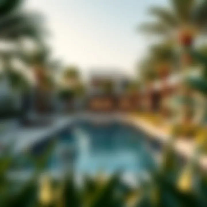 Serene Pool Area Surrounded by Nature Tranquil pool area amidst lush greenery at Water Edge Yas