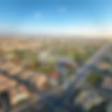 Aerial view of Warsan showcasing its urban development and green spaces